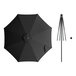 A black Lancaster Table & Seating round umbrella with a black pole.