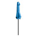 A blue umbrella on a black pole.