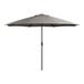 A Lancaster Table & Seating pewter gray umbrella with a black pole.