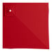 A red square Lancaster Table & Seating cantilever umbrella with a hole in the center.