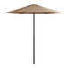 A tan umbrella with black poles.