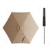 A beige round umbrella with a black push lift.