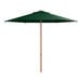 A Lancaster Table & Seating forest green umbrella with a woodgrain pole.