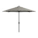 A Lancaster Table & Seating black and white striped umbrella on a white background.