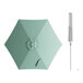 A green umbrella with a silver pole and a white handle.