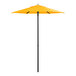 A Lancaster Table & Seating yellow umbrella on a black pole.