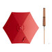 A Lancaster Table & Seating red woodgrain aluminum umbrella with a push lift.