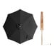 A Lancaster Table & Seating black bamboo umbrella with a wooden pole.