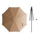 A tan umbrella with a black pole.