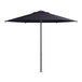 A black Lancaster Table & Seating round umbrella with a navy top and push lift handle.