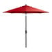 A red umbrella on a black stand.