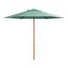 A green umbrella with a wooden pole.