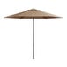 A tan Lancaster Table & Seating umbrella on a black pole.