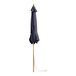 A closed Lancaster Table & Seating indigo blue bamboo umbrella on a pole.