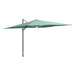 A large green Lancaster Table & Seating cantilever umbrella with lights on a metal pole.