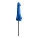 A blue umbrella on a black pole.