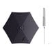 A navy blue Lancaster Table & Seating round umbrella with a silver push lift handle.