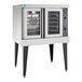 A Wolf natural gas convection oven with two glass doors.