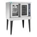 A Wolf commercial convection oven with two glass doors.