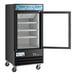 An Avantco black glass door freezer with LED lighting.