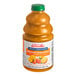 A bottle of Dr. Smoothie Orange Tangerine Smoothie Mix with orange liquid inside.