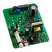 A green circuit board with many small electronic components.