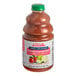 A bottle of Dr. Smoothie Guava Passion Fruit smoothie mix with a green lid.