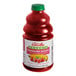 A bottle of Dr. Smoothie Organic Strawberry Banana fruit smoothie mix with red liquid inside.