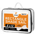 A white rectangular Xpose Safety shade sail in a bag with an orange and white label.