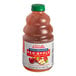 A bottle of Dr. Smoothie 100% Crushed Red Apple fruit smoothie mix with a white cap and label.