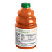 A bottle of Dr. Smoothie Organic Peach fruit smoothie mix.