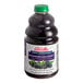 A bottle of Dr. Smoothie Boysenberry Blackberry Smoothie Mix with a green lid.