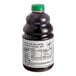 A bottle of Dr. Smoothie Boysenberry Blackberry Smoothie Mix with a green cap.