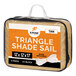 A tan triangular shade sail in packaging.
