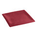 A red hemmed cloth table cover on a white background.