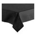 A table with a black Oxford cloth table cover with a folded edge.