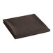 A folded chocolate brown cloth table cover.