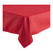 A red Oxford square table cover with a folded edge on a table.