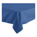 A close-up of a folded edge on a royal blue Oxford tablecloth.