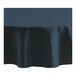 A navy blue Oxford round tablecloth with a hemmed edge.