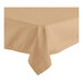 A close-up of a sandalwood Oxford hemmed cloth table cover on a table with a corner showing.