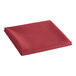 A red folded table cover on a white background.