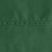 A close-up of a hunter green Oxford square table cloth.