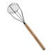 A Choice potato masher with a wood handle and chrome-plated round face.