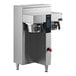 A Fetco commercial coffee brewer with a stainless steel base.