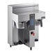 A Fetco CBS-2232 coffee brewer on a counter in a professional kitchen with a metal brew basket in place.