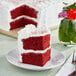 A slice of Rich's Allen Un-Iced Red Velvet Cake on a plate.