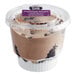 A plastic cup of Our Specialty Treat Shop Chocolate Parfait.