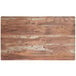 A Lancaster Table & Seating Yukon Oak bar height table with a distressed wood surface.