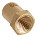 A close up of a brass hex nut.